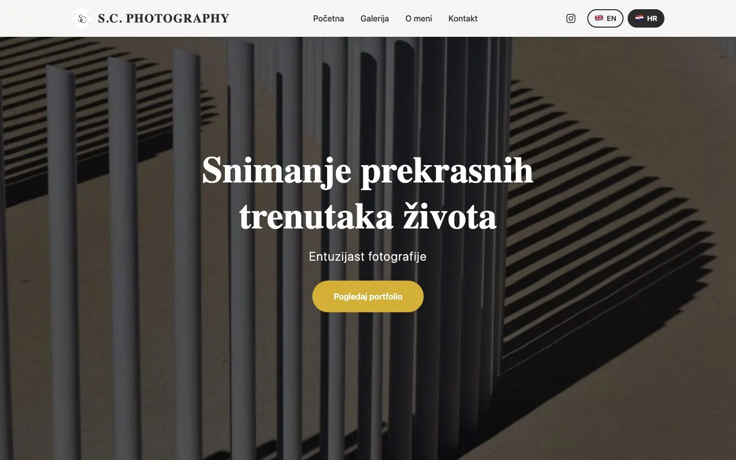 The home page of scalusic.photography, a photographer’s site running on the platform: a full-width photo of posts casting striped shadows, a Croatian headline and an EN/HR language switch